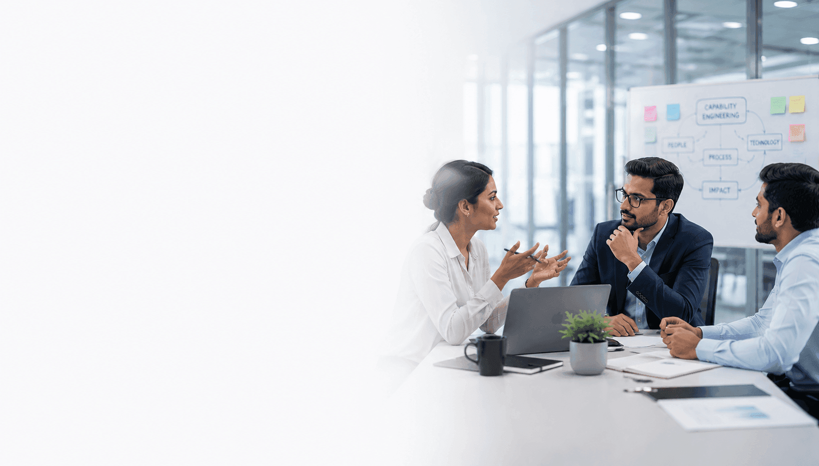 Colleagues working together in a meeting room
